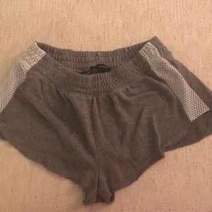 Grey short shorts with white mesh sides